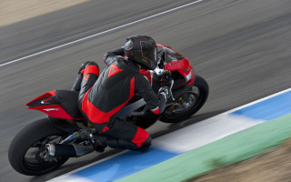 Motorcycle rider panfuturism puzzle promo - a race track free wallpaper