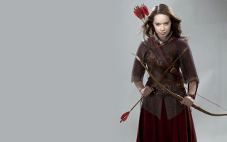 Woman costume bow arrow red - a woman in a costume holding free wallpaper for desktop