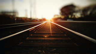 Train track sunset trees building - a train track free wallpaper