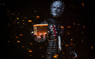 Man black suit fire sparks - his hand and a fire in the background free wallpaper