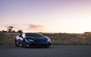 Blue sports car sunset field - vector free wallpaper