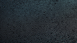 Black water drops yellow light 2 - high detail 4k free wallpaper