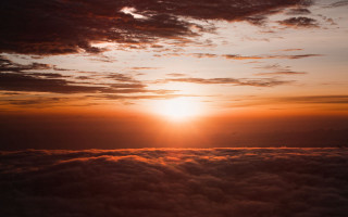 Sunset airplane window clouds orange - an airplane window free wallpaper