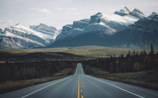Long road mountains trees sky - a long road free wallpaper