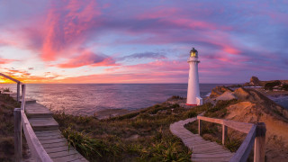 Lighthouse cliff ocean sunset pink 2 - a cliff free wallpaper
