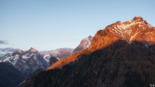 Mountain range snow capped blue 5 - a blue sky in the foreground free wallpaper