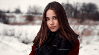 Woman snow red coat blurry 2 - black jacket free wallpaper