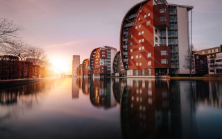 Red building reflection canal sunset - a red building free wallpaper for desktop