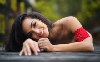 Red bikini woman smiling wooden - a red bikini free wallpaper