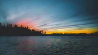 Sunset lake trees mountains clouds 2 - a sunset over a lake free wallpaper