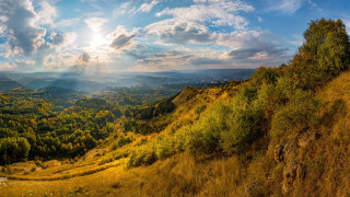 Valley sunbeam trees mountain autumn - a scenic view of a valley free wallpaper for desktop