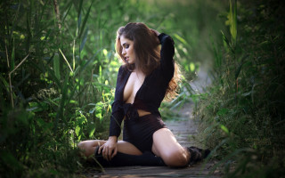 Woman black dress heels wind - a grassy area free wallpaper