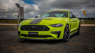 Bright yellow mustang parking lot - realistic free wallpaper for desktop