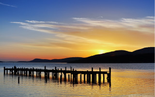 Sunset dock mountains water clouds - bob thompson free wallpaper for desktop