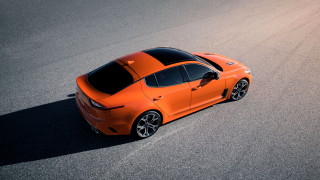 Orange car panfuturism 3d render - a black roof free wallpaper