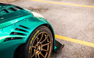 Green sports car yellow stripe 3 - the side of the road free wallpaper for desktop