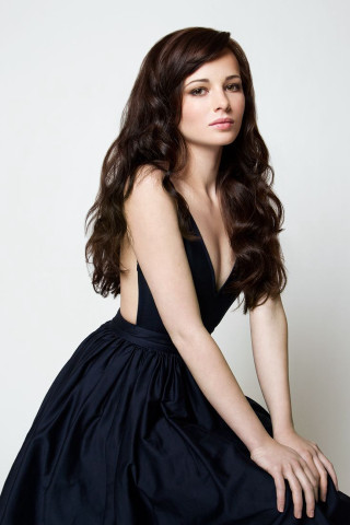 Woman black dress crossed legs - long dark hair free wallpaper for mobile