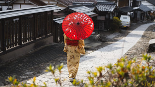 Woman umbrella japan impressionist scenery - a street holding free wallpaper for desktop
