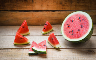 Watermelon halves fruit wooden table - a wooden table free wallpaper for desktop