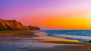 Mystical beach cliff sunset ocean - a cliff and a body of water free wallpaper