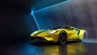 Yellow sports car dark room 13 - a yellow sports car free wallpaper