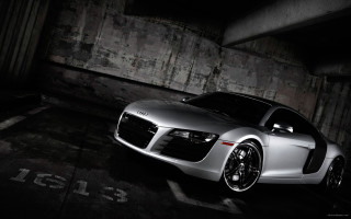Silver sports car night parking - a concrete wall free wallpaper