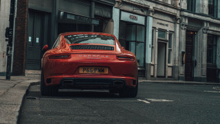 Red porsche urban cinematic tilt - the side of the road in front free wallpaper