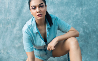 Woman blue shirt shorts posing - free portrait wallpaper for desktop