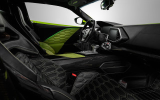 Green black interior car steering - wheel and dashboard free wallpaper