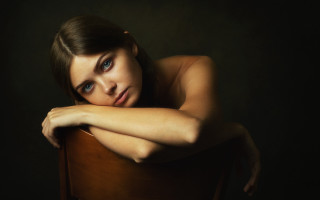 Woman crossed arms chair blue - a chair free wallpaper