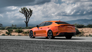 Orange sports car desert road - xf iq4 free wallpaper
