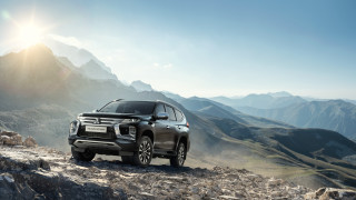 Black suv mountain road landscape - the background and sun free wallpaper