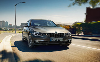 Silver car driving street tall - bernt tunold free wallpaper