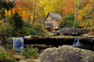 Small wooden cabin hillside waterfall - a lush green hillside next free wallpaper