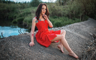 Red dress river nature sitting - a rock next free wallpaper