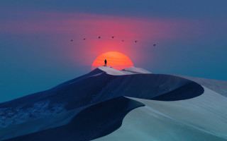 Sunset mountain birds person desert - a sunset over a mountain free wallpaper