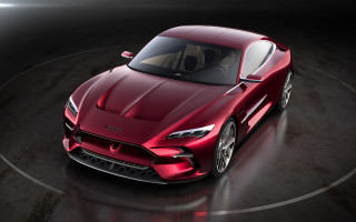 Red sports car top view 2 - a dark surface free wallpaper