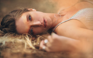 Woman lying braided portrait photorealistic - free textures wallpaper