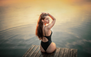 Woman black swimsuit dock sunset - sunset time free wallpaper