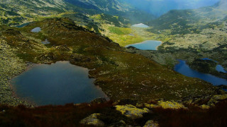 Mountain lake background range scenery - a view of a mountain range free wallpaper