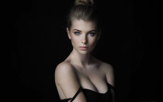 Woman bun blueeyes dark background - a picture in the dark free wallpaper