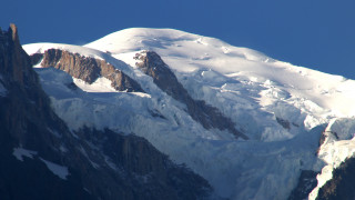 Snow mountain blue sky clouds 2 - a clear blue sky in the background free wallpaper
