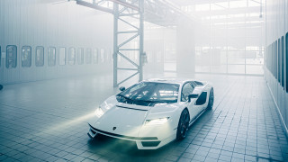 White sports car large building - a white sports car free wallpaper for desktop
