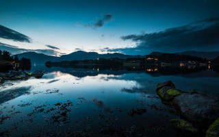 Lake rocks night clouds city - david paton free wallpaper
