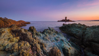 Lighthouse rocky shore sunset pink 2 - romanesque free wallpaper for desktop