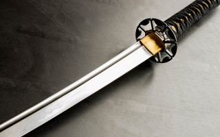 Sword gold handle black background - sharp high detail free wallpaper