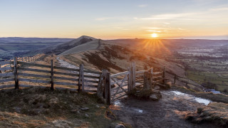 Wooden fence hill sunset mountain - a sunset in the background and a mountain in the distance free wallpaper
