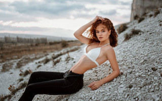 Elina karimova beach sitting rock - a rock wall free wallpaper for desktop