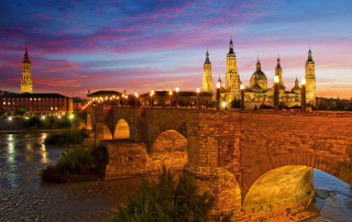 Bridge river castle night lights - a castle in the background free wallpaper