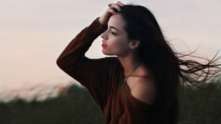 Woman longhair field hands on - a field of grass free wallpaper for desktop